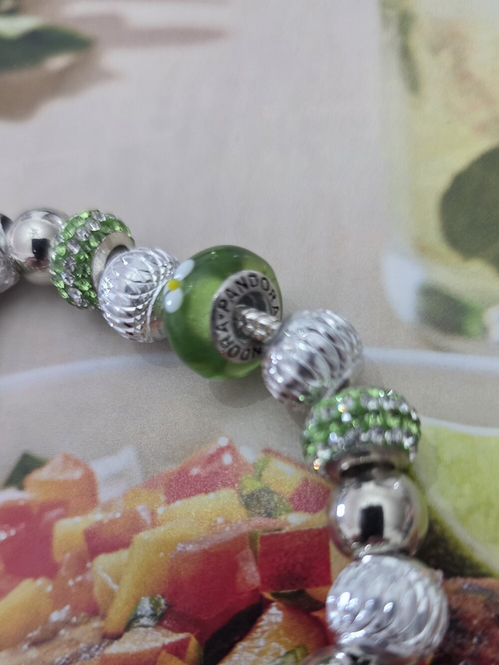 7-inch Pandora-style bracelet with a genuine Pandora bead (see photos).